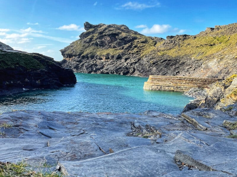 A landscape photograph of rocks and the ocean